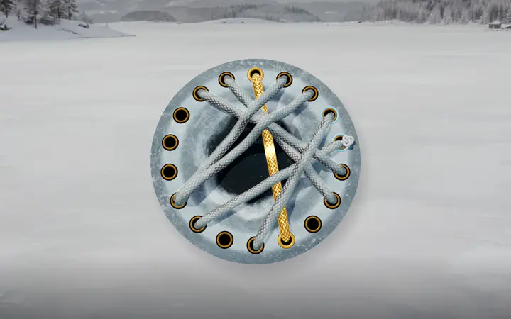 A frosted loom around a hole in the ice.